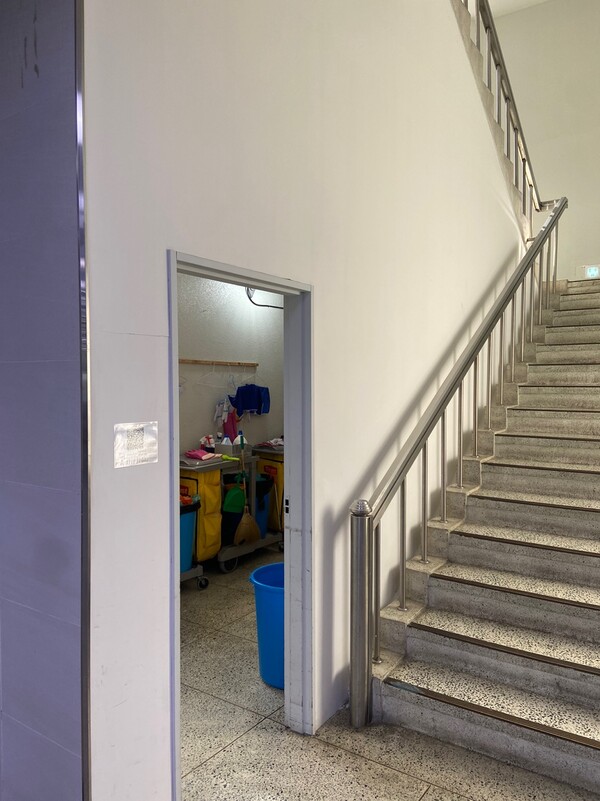 The janitors’ break room under the stairs in the Central Library. Even though part was improved, they are still suffering from noise.