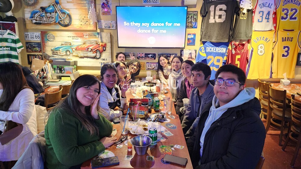 Photo of Ibero-America Alumni Association enjoying a "Christmas event" at LA Bar & Grill located in Gwangalli on December 28th, 2024 [Provided by interviewee]